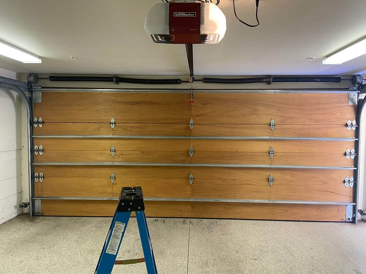 What Size Garage Door Opener Do I Need For a 16 Foot Door? by David