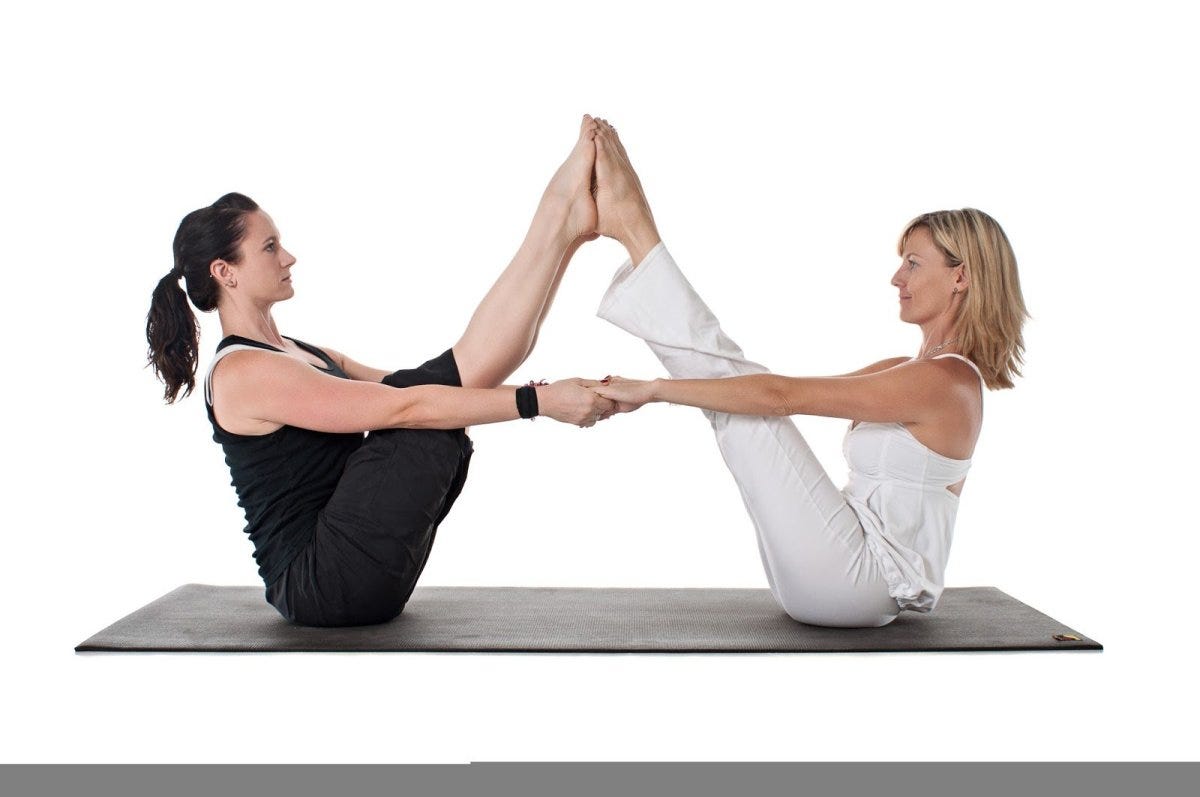 Two Women Doing Partner Yoga Asana Camel Pose And Scorpion Stock Photo -  Download Image Now - iStock
