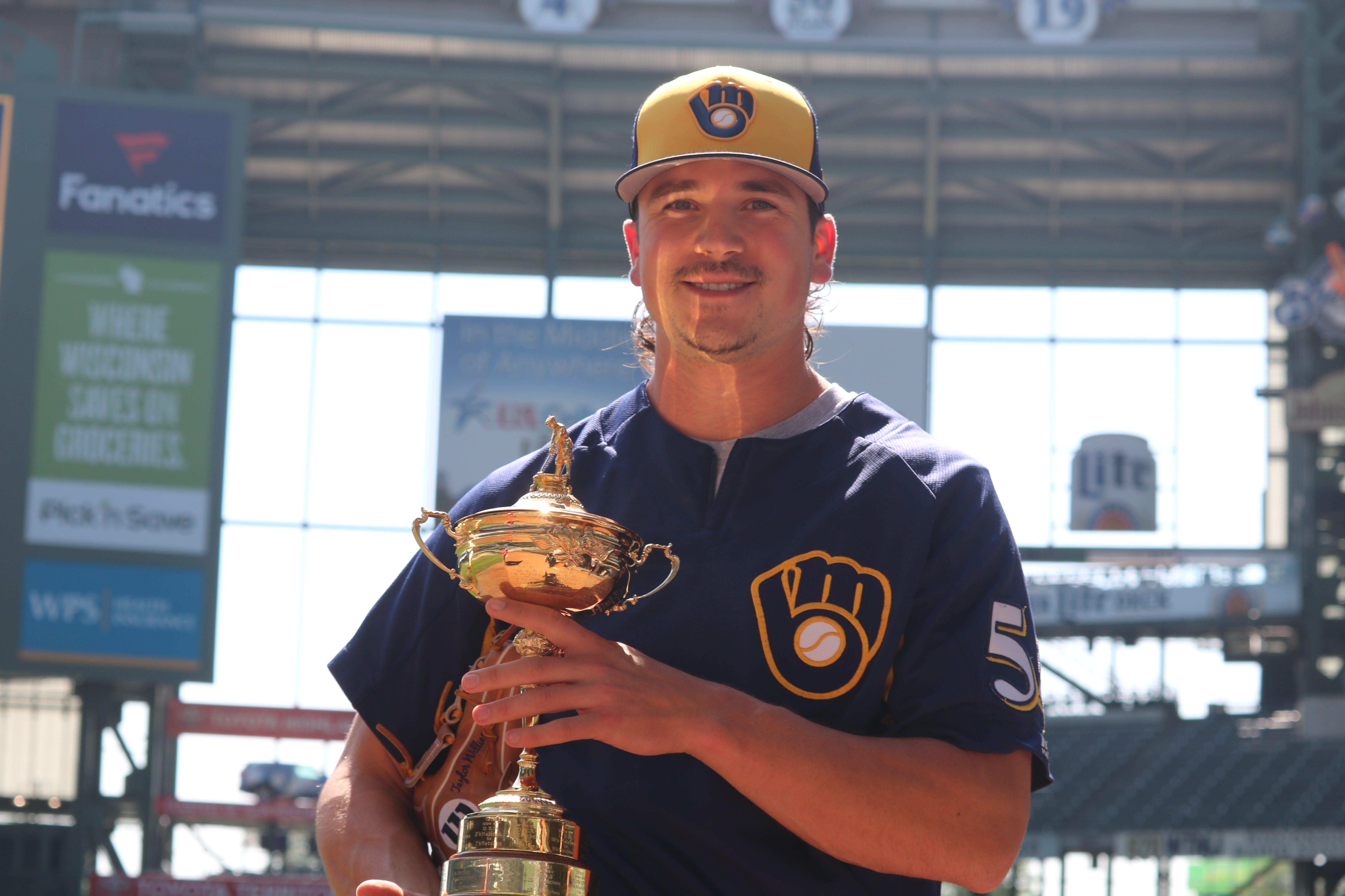 Cameron Yelich Throws Ceremonial First Pitch, by Caitlin Moyer