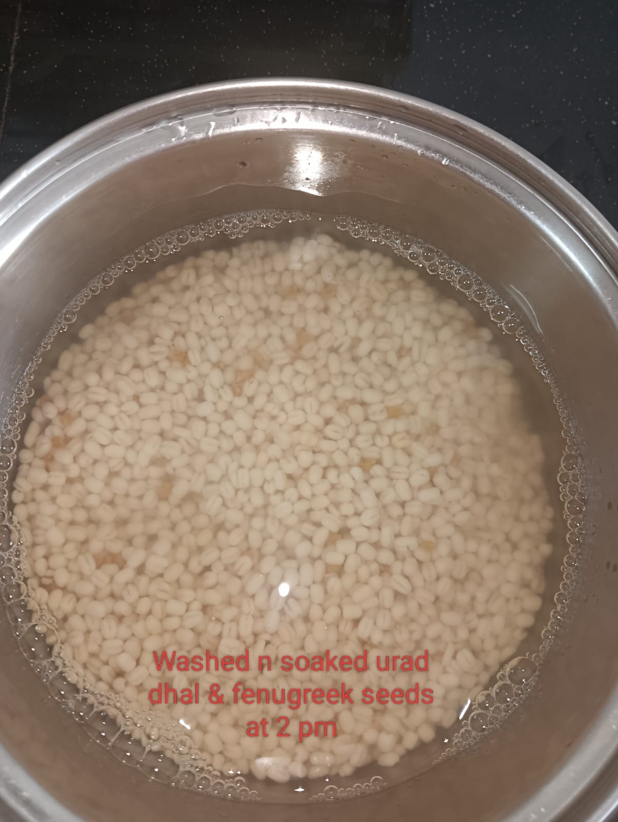 Washed and soaked urad dal and fenugreek seeds (Photo credit: Deepambika T J)