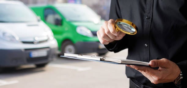 looking at data through a magnifying glass in a call forecourt