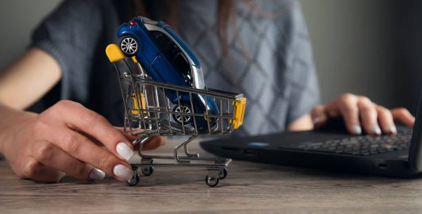 purchasing a model sized vehicle in a trolley