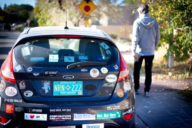 Putting stickers on car rear window deals
