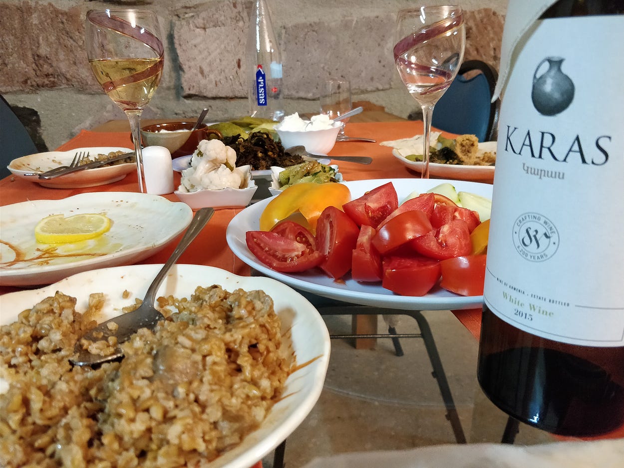 Dinner with Boris and a fine Armenian Wine over Mimino. Image by Author. Three Unique Experiences I Enjoyed with Strangers in Armenia