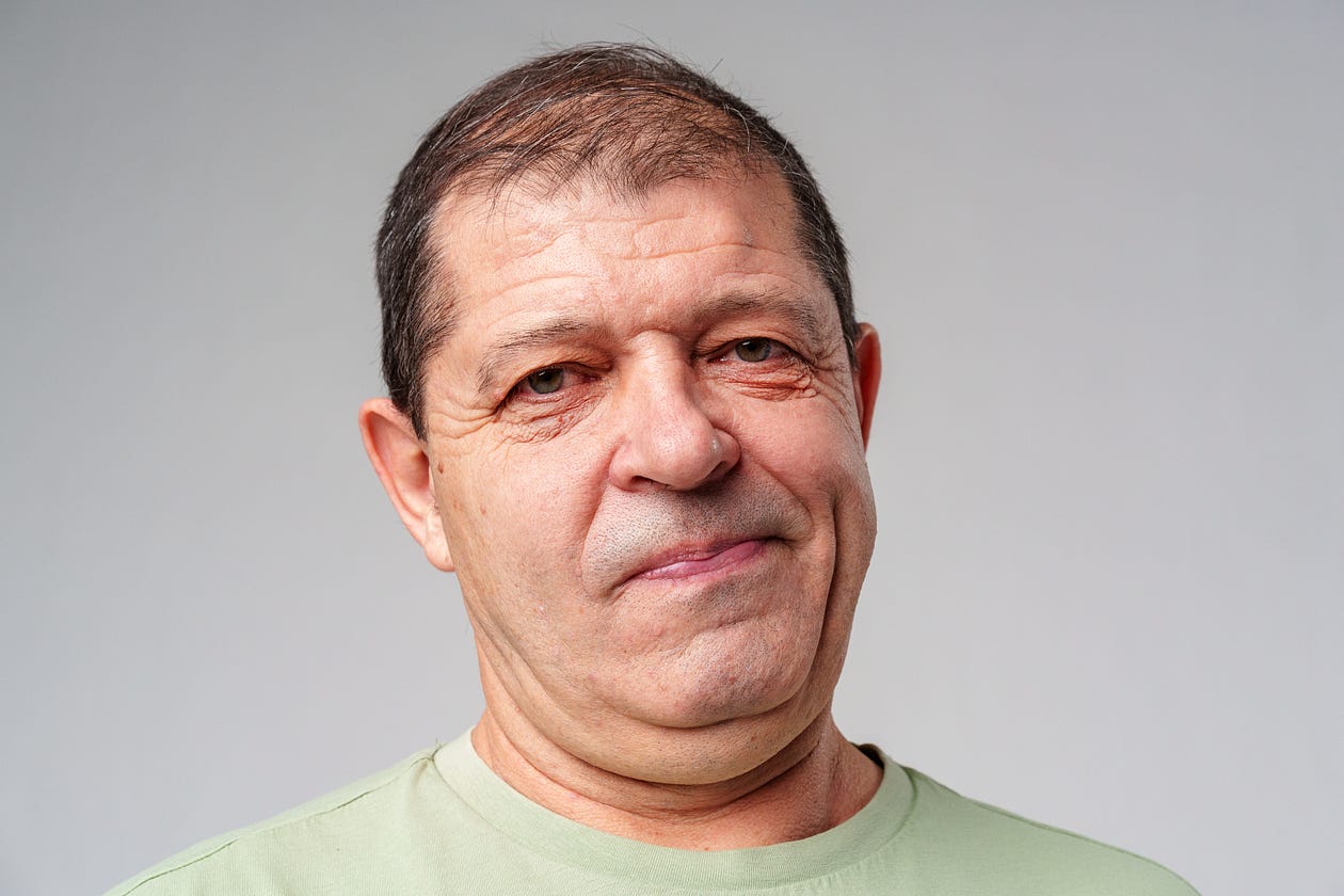 Affair Partner Michael Christopher, late 40s white man, clean-shaven, fleshy face, smirking