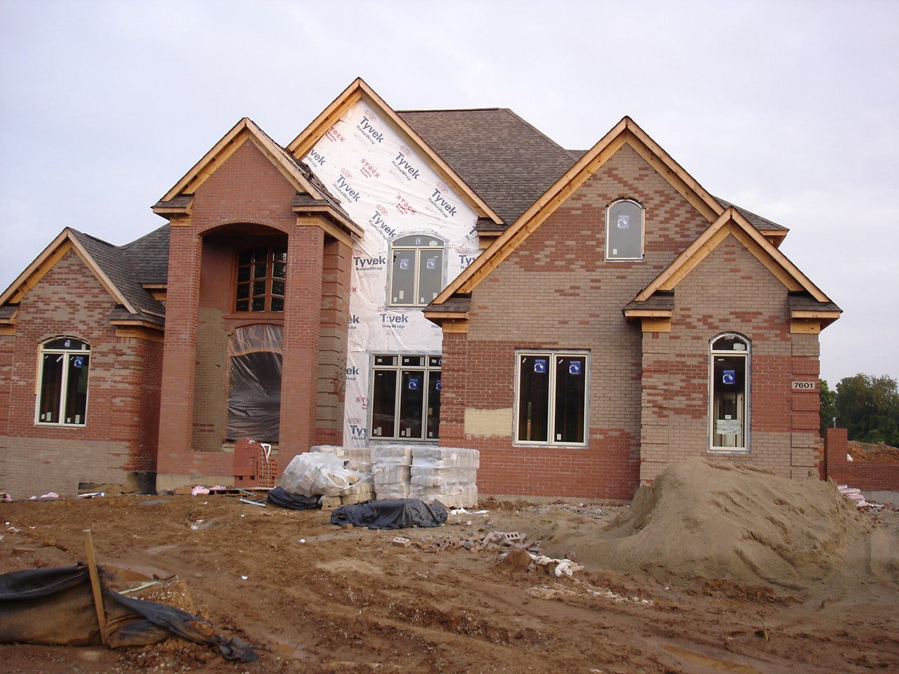 Another McMansion under construction (hopefully not as a second home at least). (Image from merfam via Flickr)