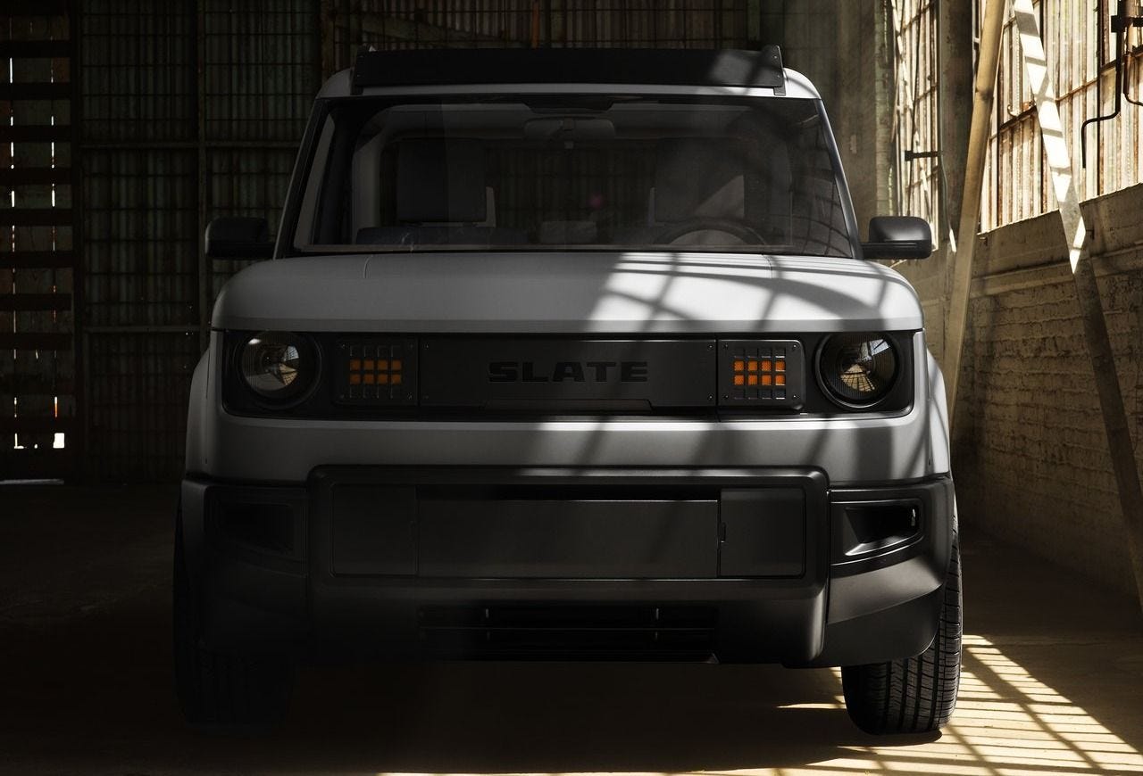 The Slate vs. The Hilux Champ: A Tale of Two Bare-Bones Trucks