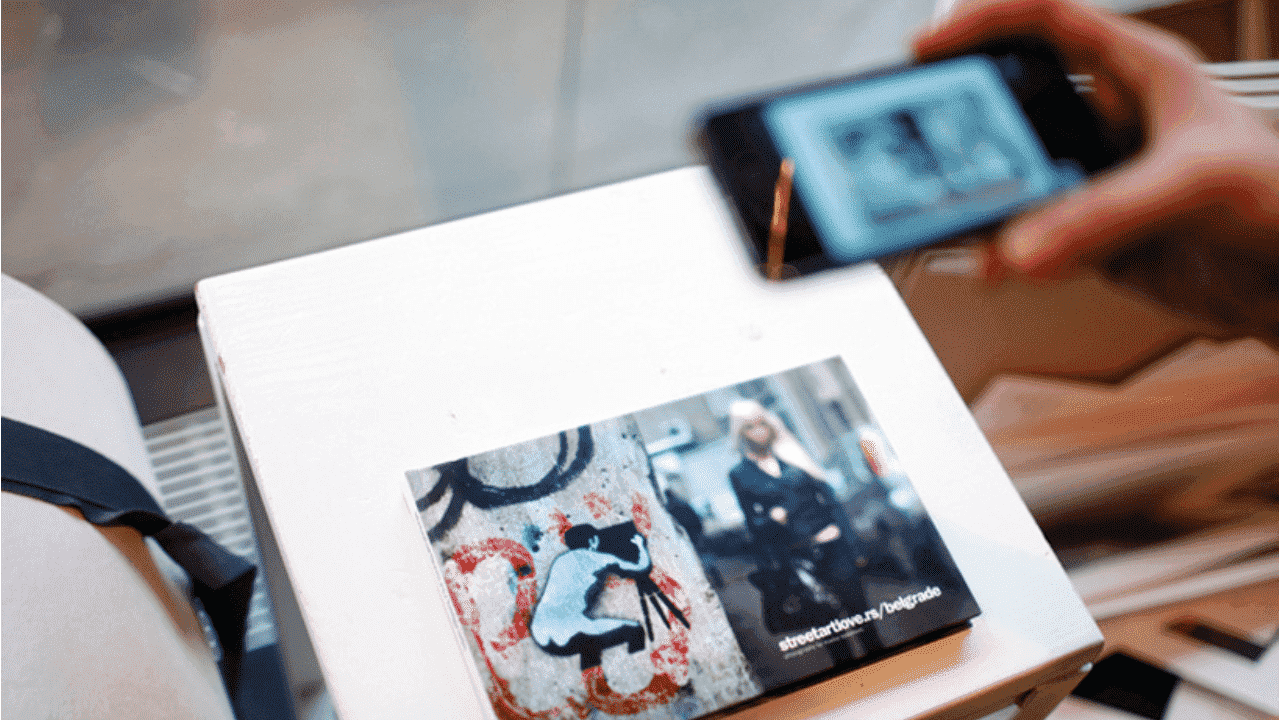 Scan the art book page and watch AR bring it to life instantly.
