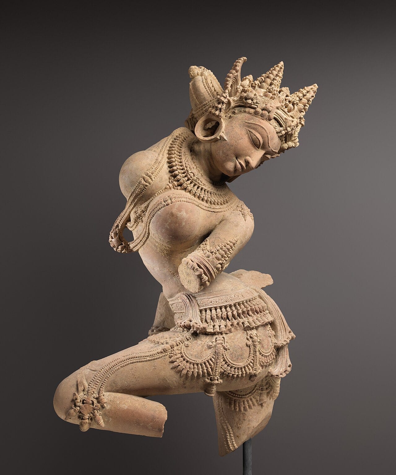 The female body was imagined as perfection itself; each curve, pose, and expression in ancient Indian sculpture speaks of a culture that looked at women as something beyond the human world. (Image credit- Wikimedia Commons Celestial dancer (Devata) mid-11th century, Chandela period, Madhya Pradesh)