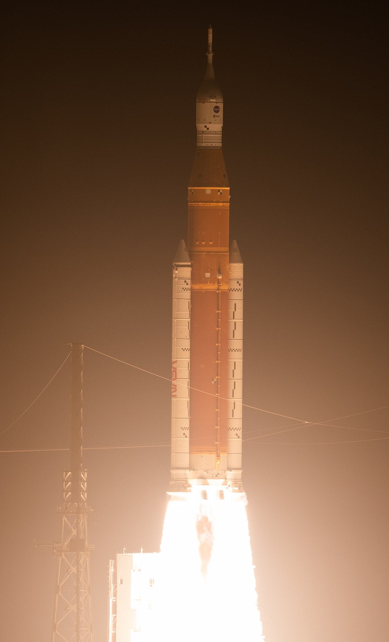 Launch of the SLS super-heavy rocket  Launch of the Space Launch System (SLS) super-heavy rocket carrying the Orion spacecraft on the Artemis I mission. This flight became the first test of the new architecture for crewed missions beyond low Earth orbit, which emerged after the cancellation of the Constellation program and inherited part of its technical solutions.  Credit: NASA  Source: NASA Artemis I Launch Photos