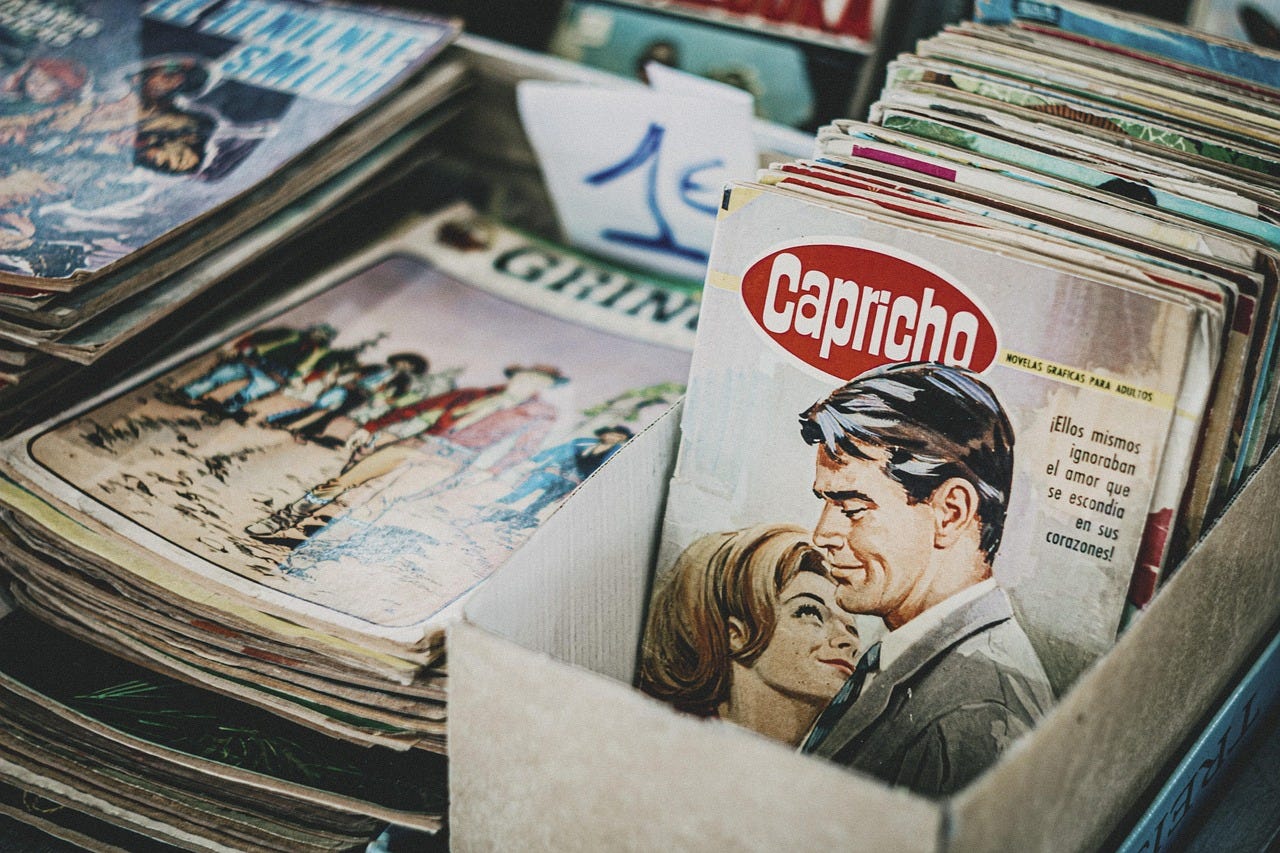 A collection of old magazines and other paper-printed antiques on sale — Image by Antonio Cansino from Pixabay