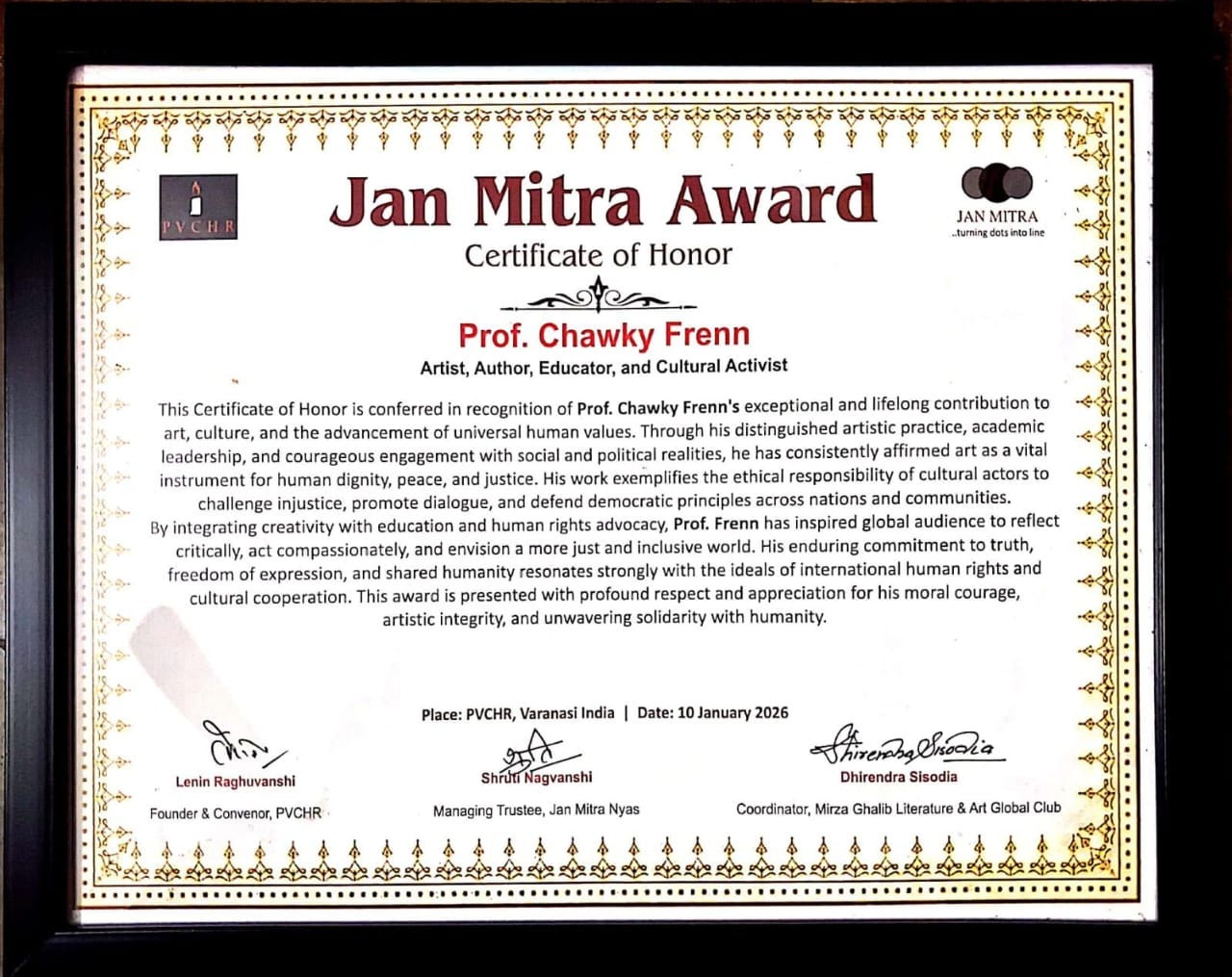 Professor Chawky Frenn receives the Jan Mitra Award (Certificate of Honor) in Varanasi on 10 January 2026, recognizing his lifelong contribution to art, human dignity, peace, and justice. The certificate is jointly signed by Lenin Raghuvanshi (Founder & Convenor, PVCHR), Shruti Nagvanshi (Managing Trustee, Jan Mitra Nyas), and Dhirendra Sisodia (Coordinator, Mirza Ghalib Literature & Art Global Club), symbolizing a shared commitment to culture, democracy, and human rights.
