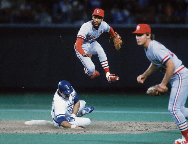 St. Louis Cardinals Ozzie Smith(1) in action during a game from his career.  Ozzie Smith played for 19 years with 2 different teams and was a 15-time  All-Star and was inducted to