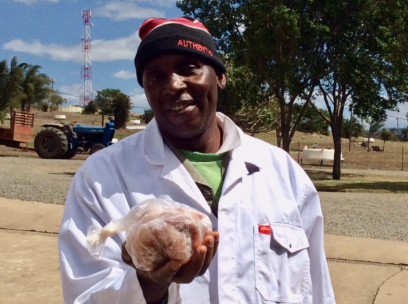 Joram Ntlemo with a kilo of frozen croc meat that made it home to my fridge and — much later — into a casserole for an unsuspecting friend. Photo: Wanda Hennig