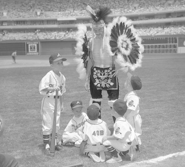 The Atlanta Braves cap pays tribute to their original mascot Chief Noc-A- Homa (Knock a Homer).