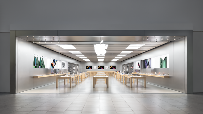 Image of an apple store with monochromatic and neutral color scheme.