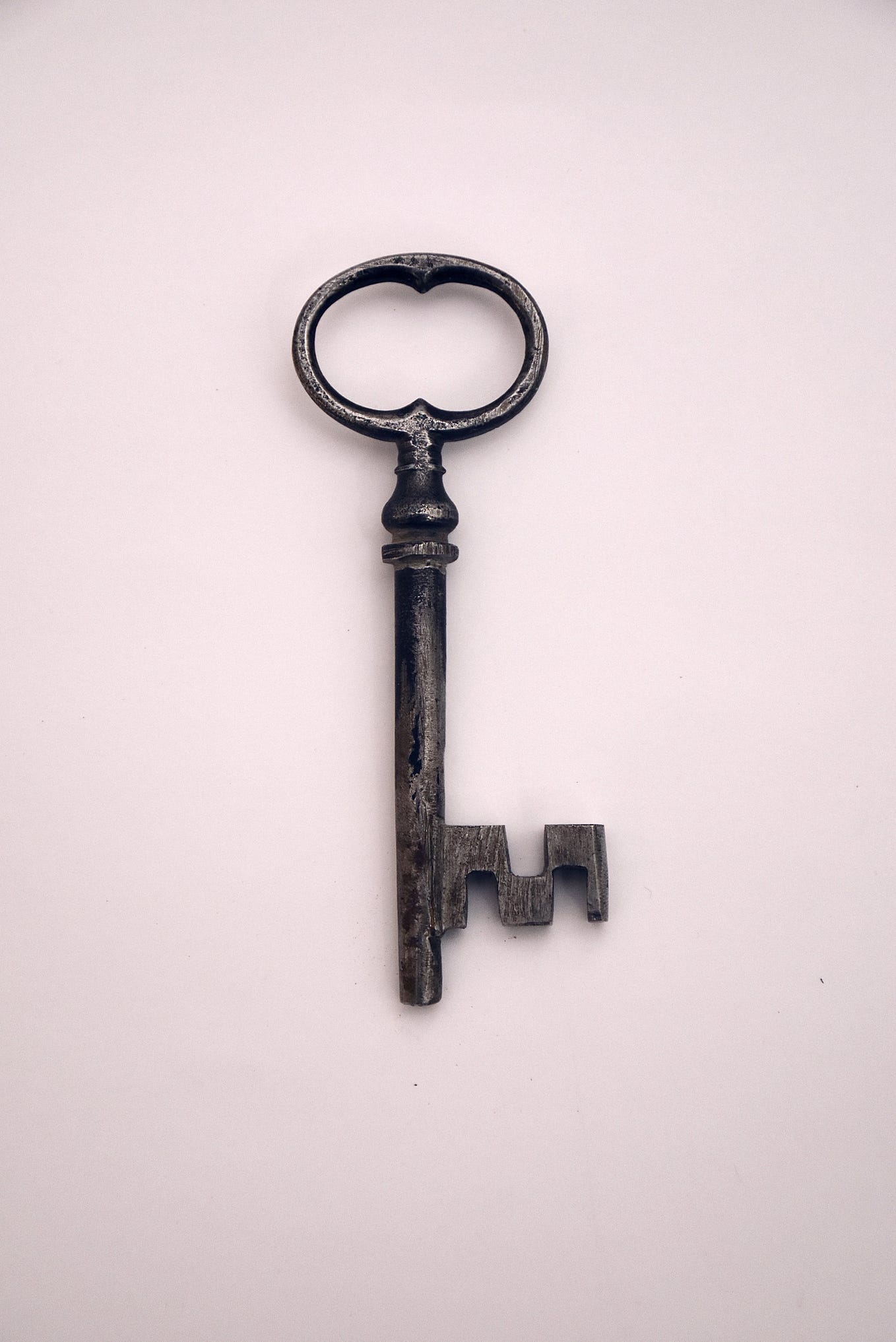 A key on the pink background