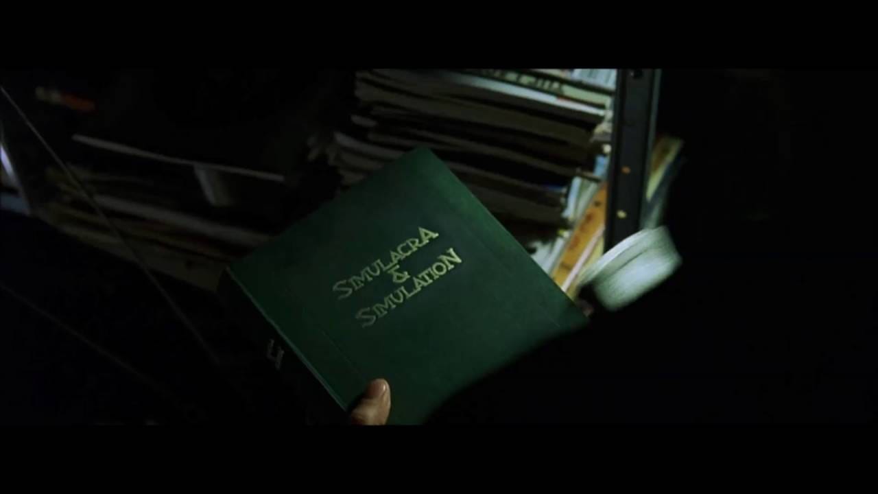 In The Matrix, we all know Neo opens the book Simulacra and Simulation,  which is about how human experience is of a simulation of reality. But he  opens the chapter to On