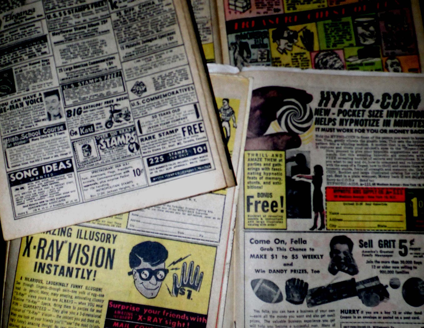 A selection of 1960s Marvel comics, showing mail order ads.