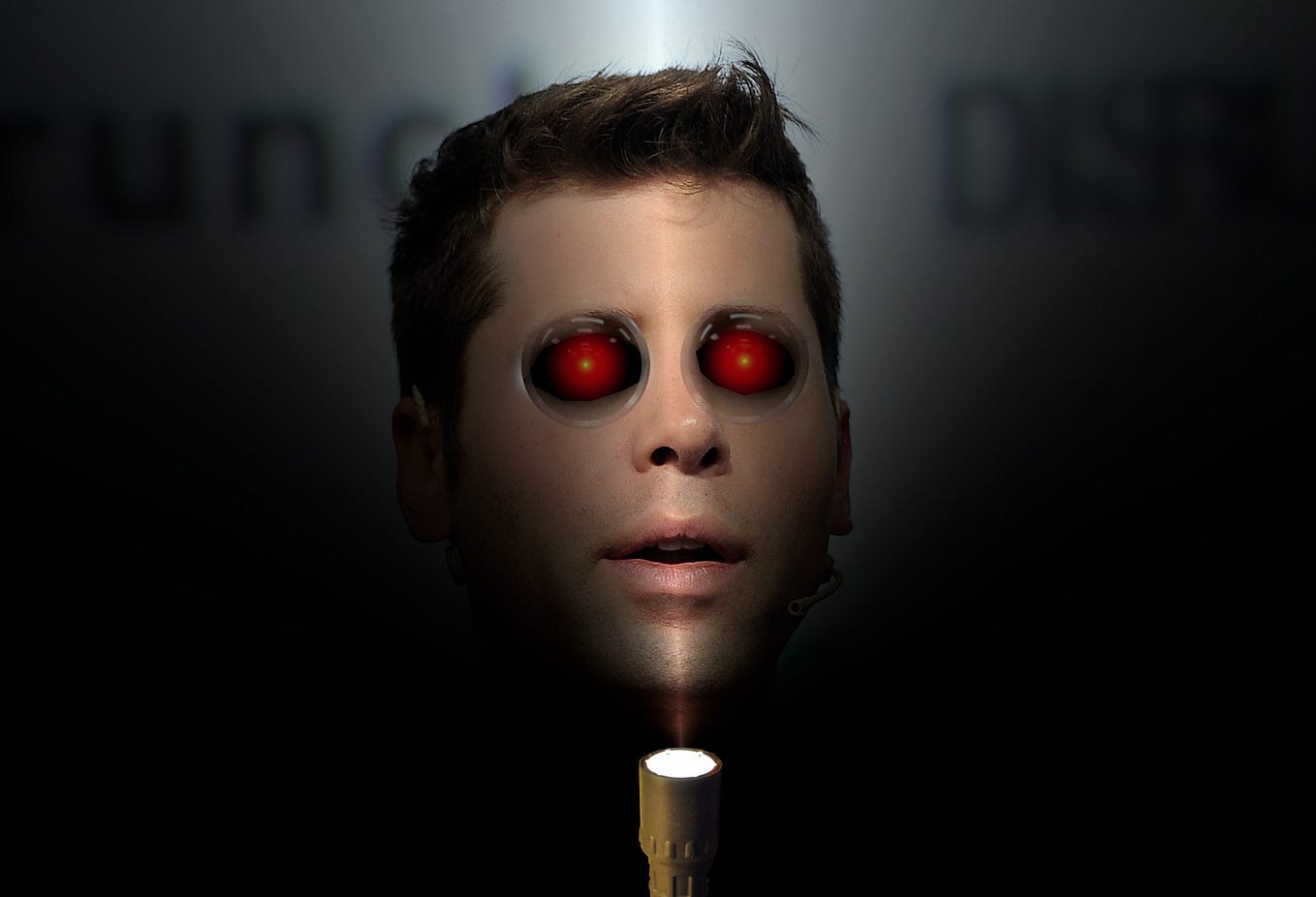 A portrait of OpenAI founder Sam Altman. It has been altered so that his eyes are replaced with the glaring red eye of HAL9000 from Stanley Kubrick’s 2001: A Space Odyssey. He is holding a flashlight under his chin and is shrouded in darkness.
