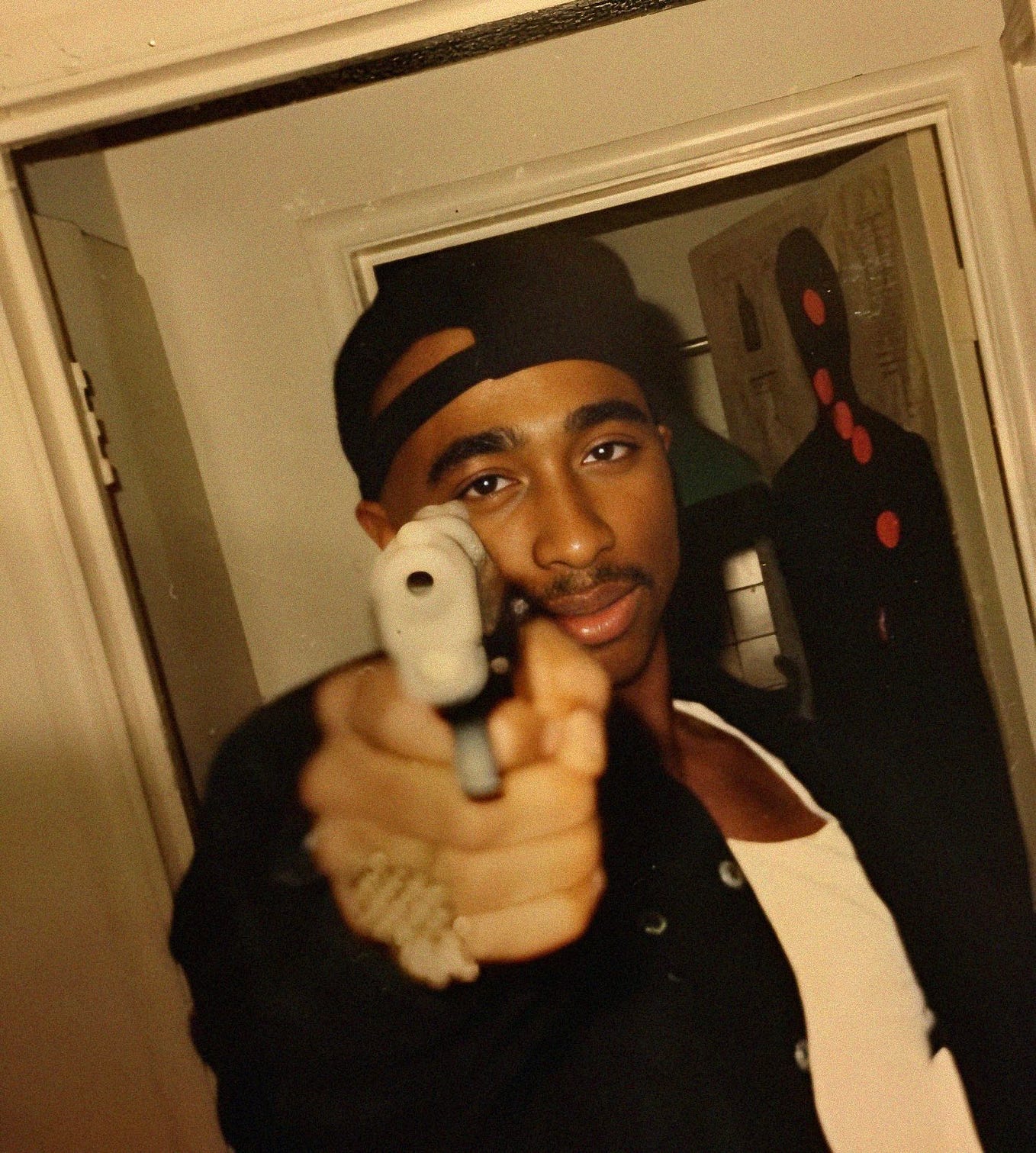 Fatherhood in the Sunshine: Tupac Shakur s Day at the Playground by Fatherhood in the Sunshine: Tupac Shakur s Day at the Playground by