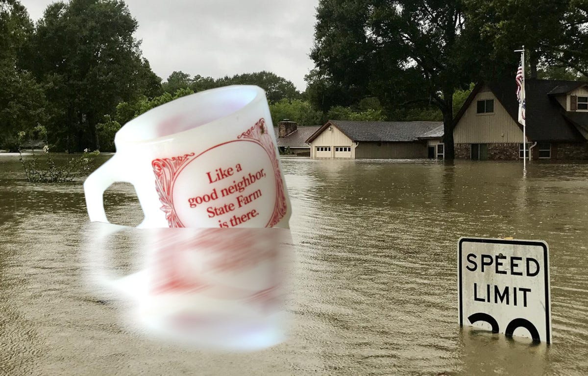 A flooded suburban street with water up to the roofline of the houses in the background. In the foreground floats a giant mug emblazoned ‘Like a good neighbor, State Farm is there.’