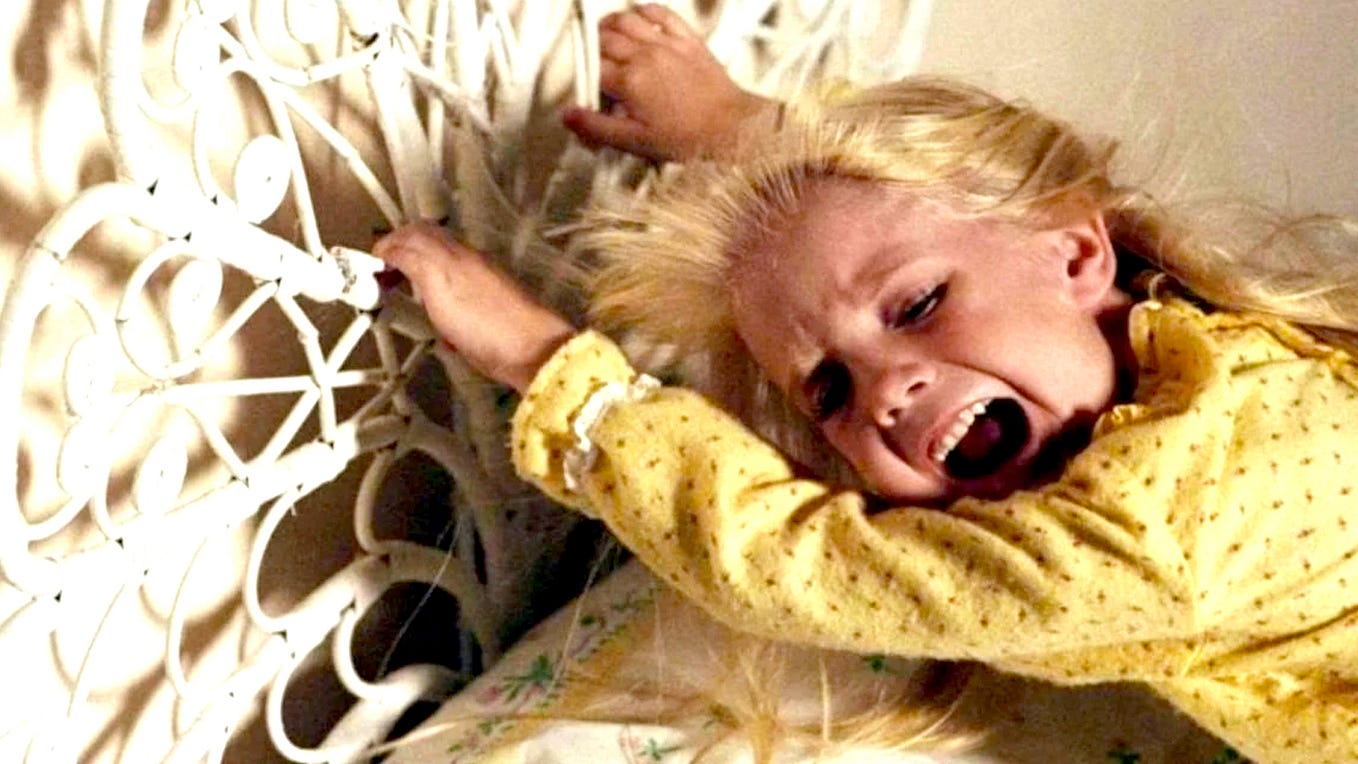 Screenshot of the late Heather O’Rourke as the terrified Carrie Ann in ‘Poltergeist.’