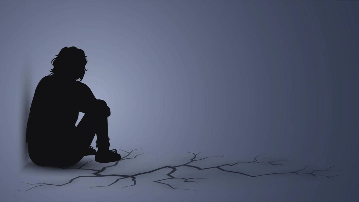 Person silhouette sitting on the floor, depression concept