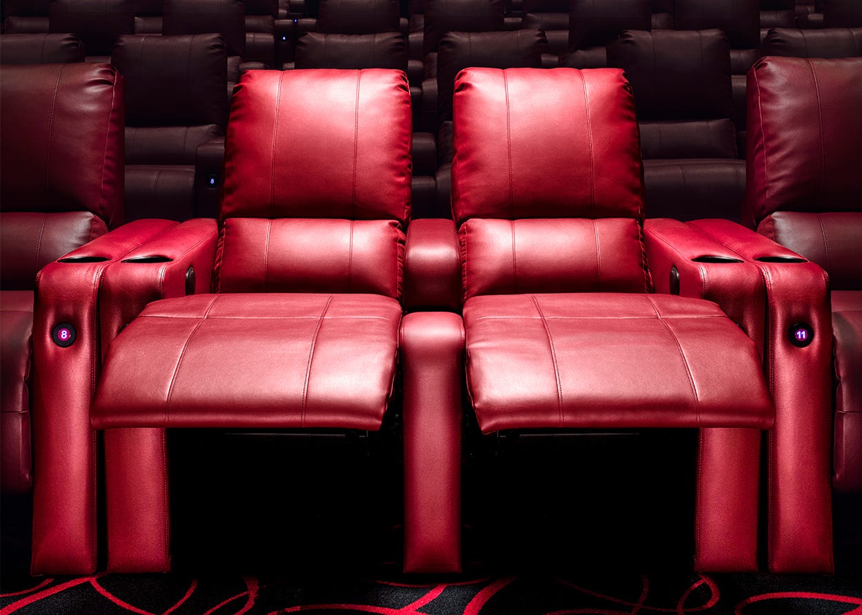 What's Up With Couple Seating In Theaters? | by Sera Maddingly | Broken  Mirror Reflections | Medium