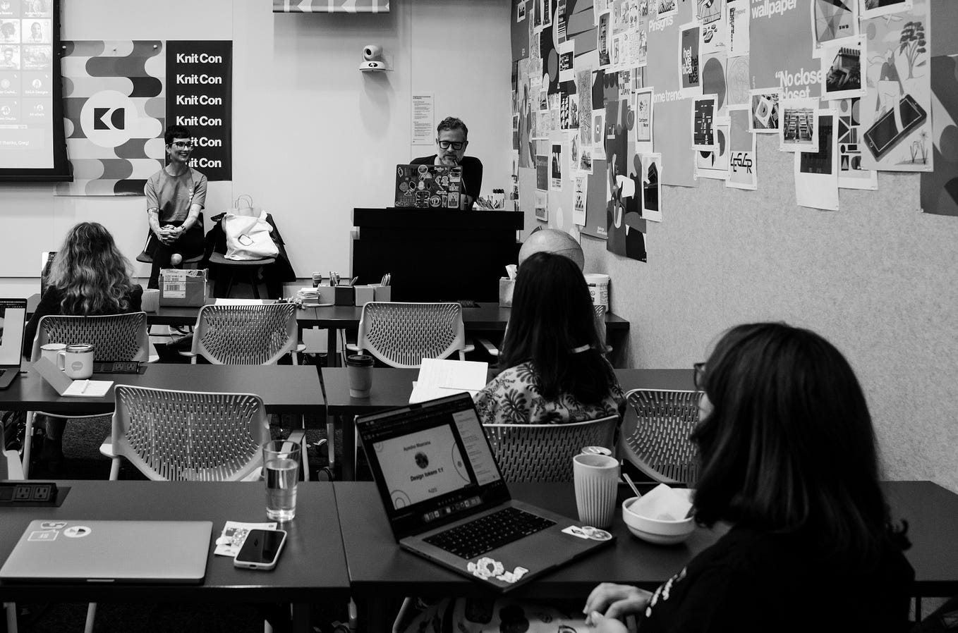 Black and white photo of a conference room full of Design System Day participants