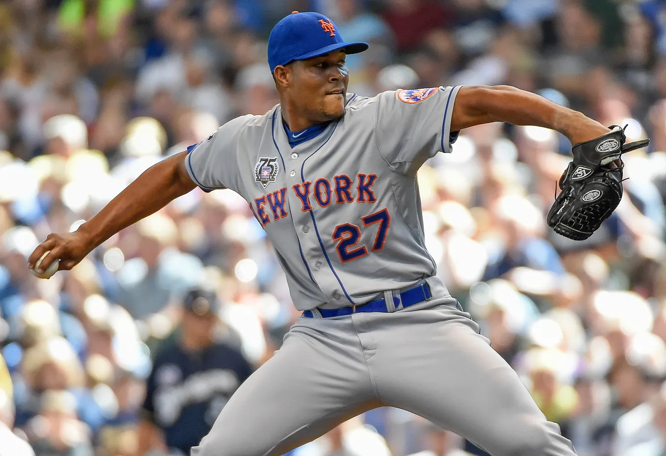 Jul 27, 2014; Milwaukee, WI, USA; New York Mets pitcher Jeurys Familia (27) pitches in the eighth inning against the Milwaukee Brewers at Miller Park. Mandatory Credit: Benny Sieu-USA TODAY Sports