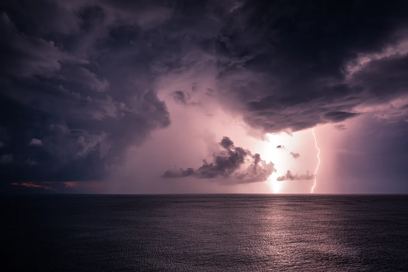 Sea with storm clouds and lightning