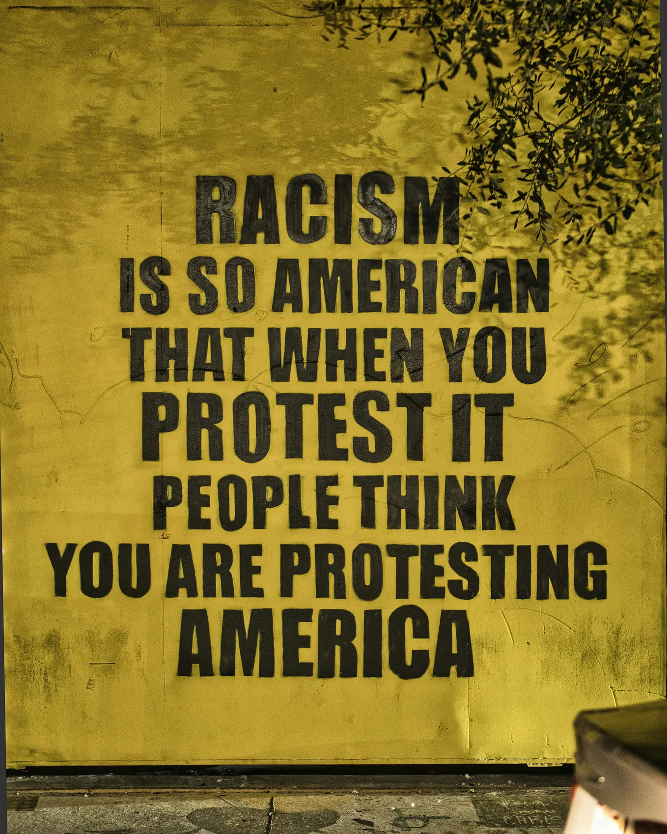 RACISM IS SO AMERICAN THAT WHEN YOU PROTEST IT PEOPLE THINK YOU ARE PROTESTING AMERICA