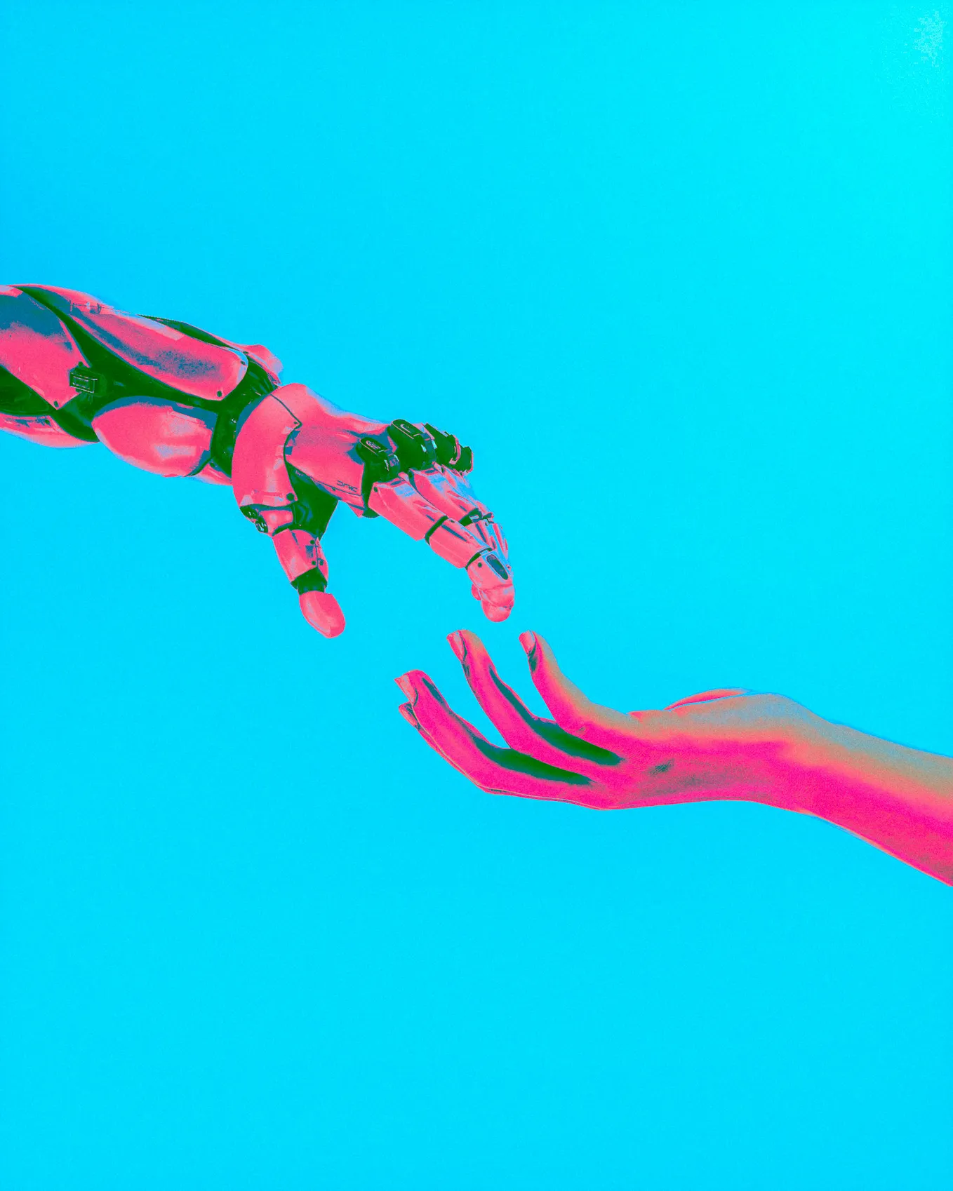 Robot hand reaching to human hand.