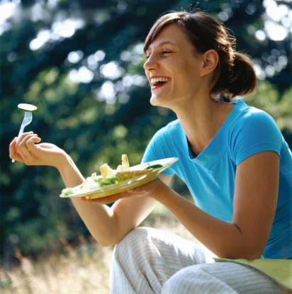 Women Laughing Alone With Salad