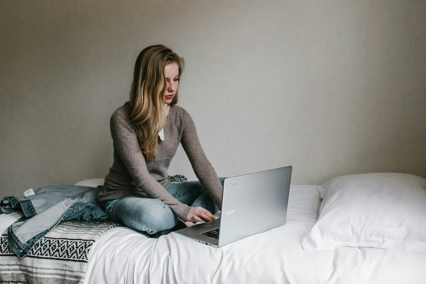 A woman working on a laptop