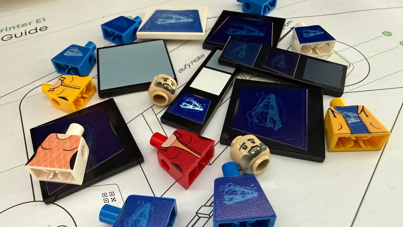 LEGO pieces as test prints on the EufyMake E1 UV printer setup guide.