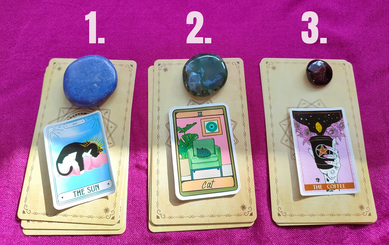 The Moon tarot card featuring a wolf, a dog, a crayfish, and two towers under a moonlit sky