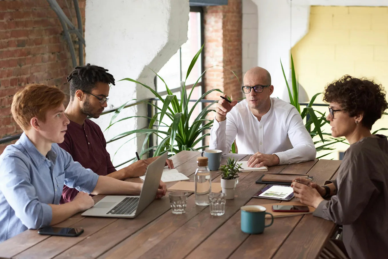 People Sitting While Discussing Business