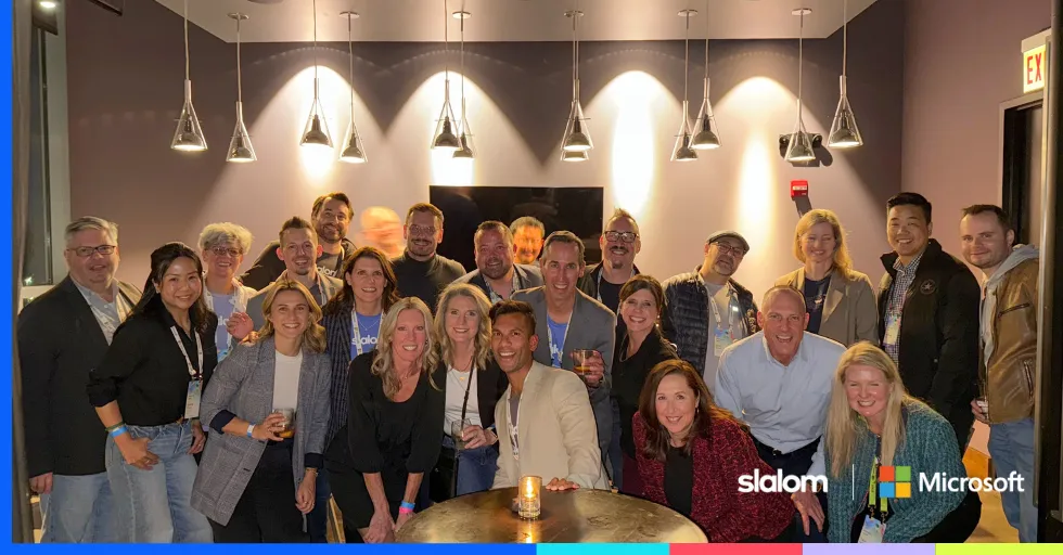 People gathered for a group photo at a Microsoft Ignite event