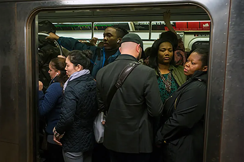 Commuters on the NYC subway