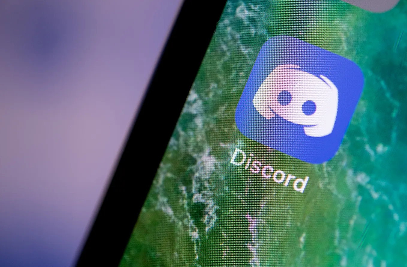 The Discord app displayed on the screen of an iPhone.