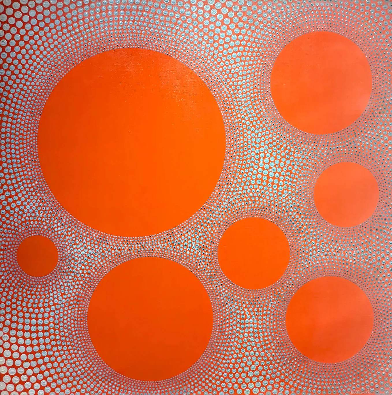 Picture of a painting of orange circles on a background of tiny orange circle outlines