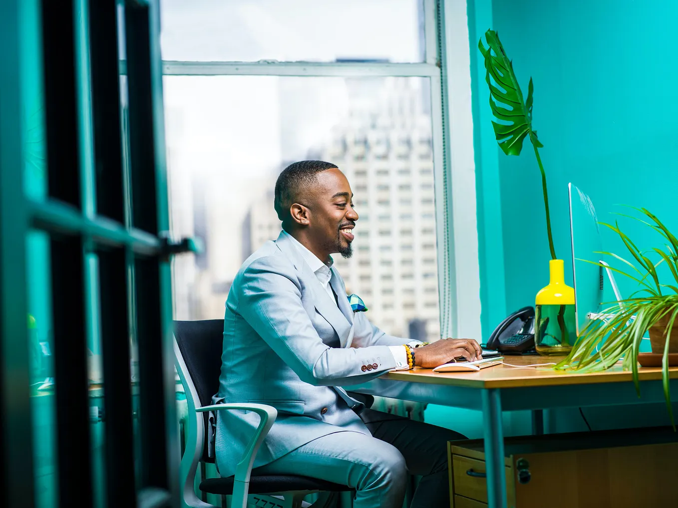A businessman learning English online for business purposes