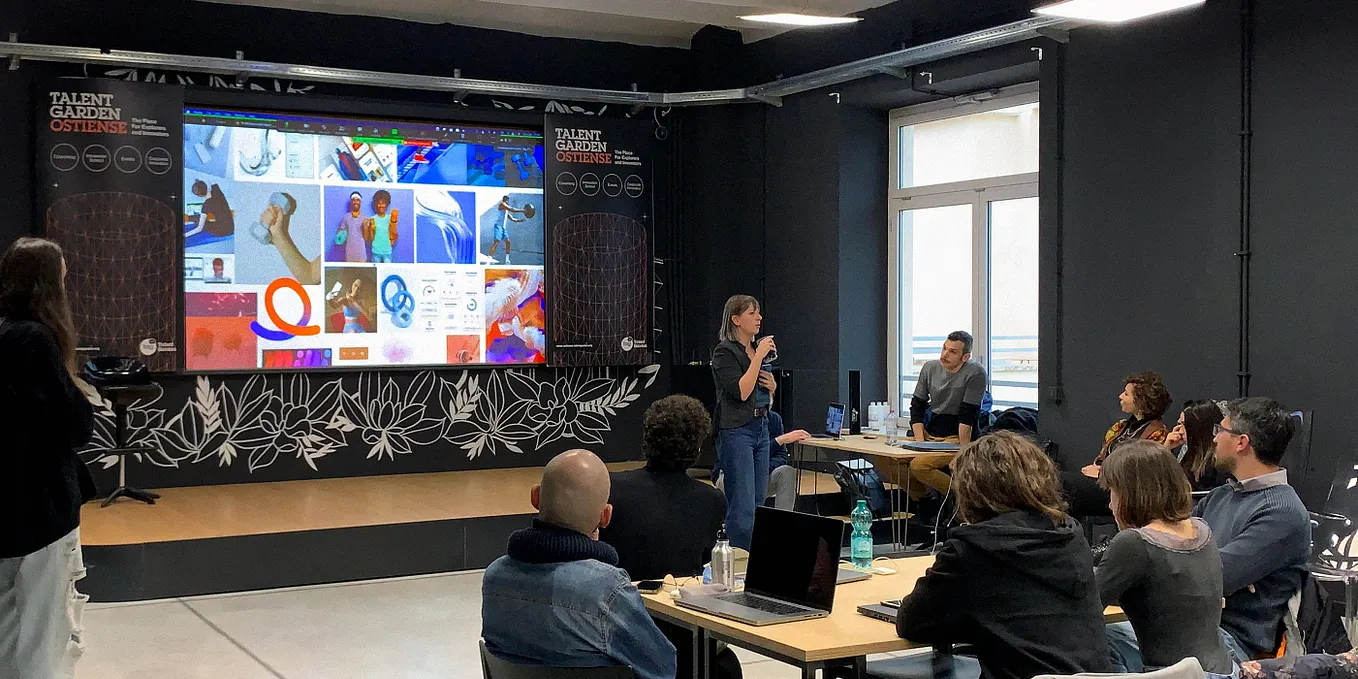 A student presenting the moodboard of her group’s app