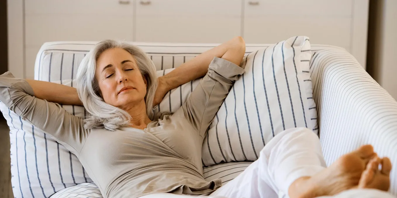 woman reclining on couch