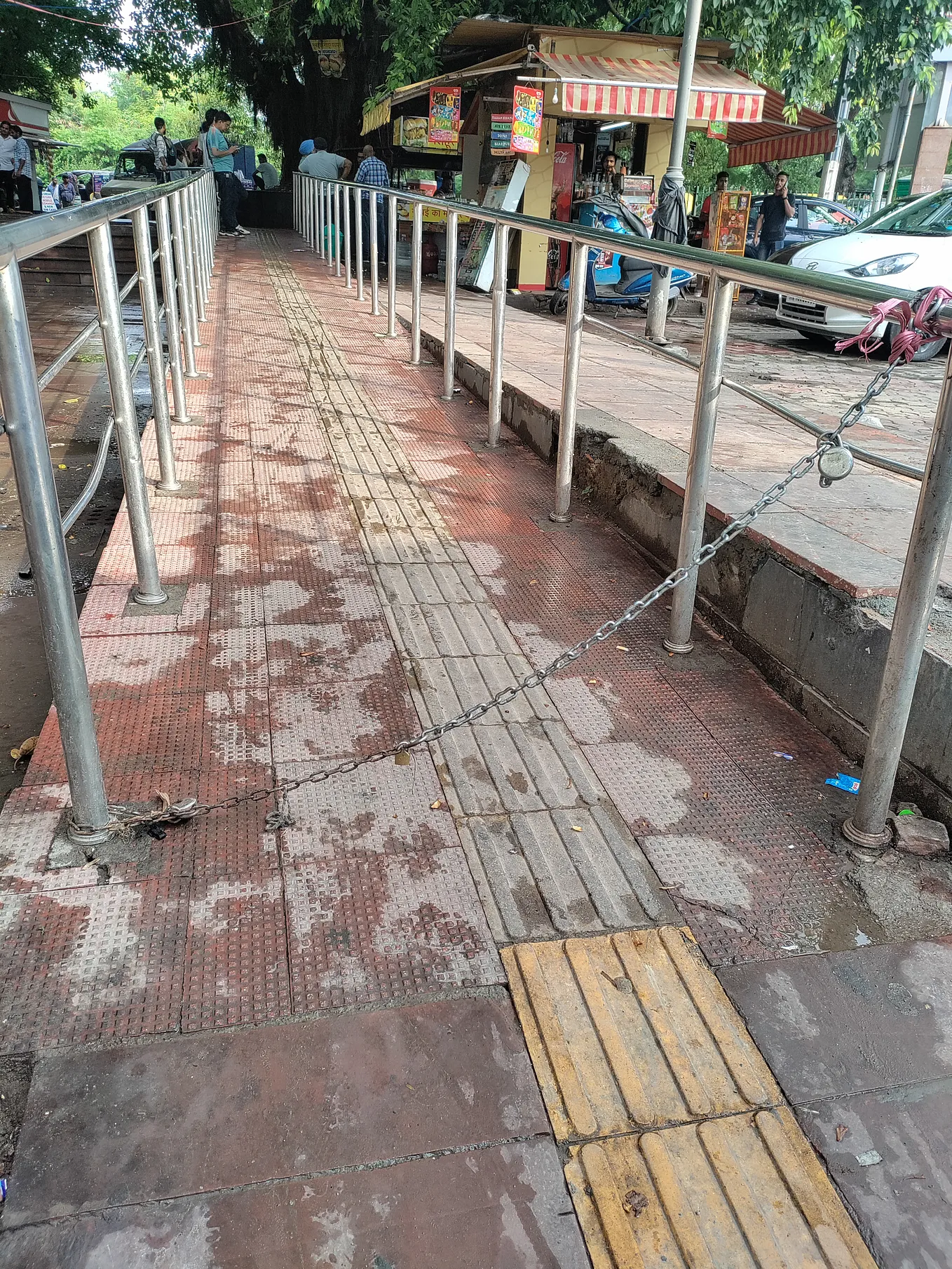 Image of ramp whose entry has been locked with chains in new friends colony community centre market