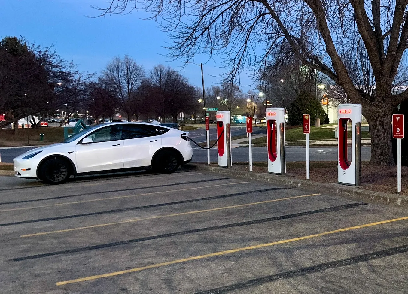 IMAGE: A Tesla charging in a supercharger