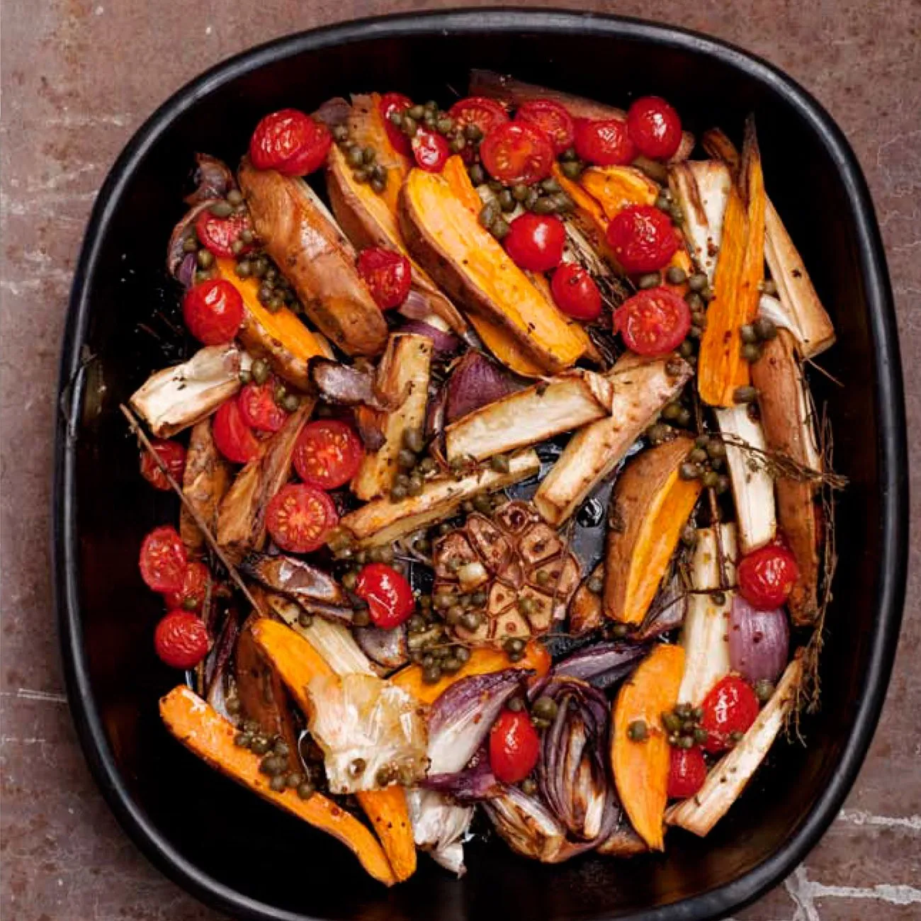 Ottolenghi’s roasted parsnips and sweet potatoes with caper vinaigrette