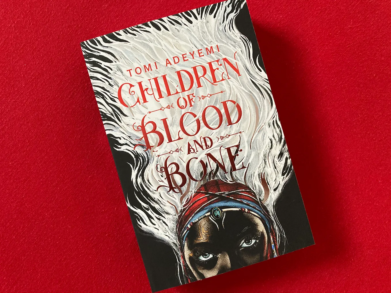 “Children of Blood and Bone” by Tomi Adeyemi — Fantasy meets Love Story